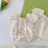 sg-11134201-22110-hqijxxe73wjv00.webp Floral Garden Baby Romper